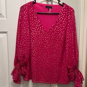 1. State pink and gold blouse